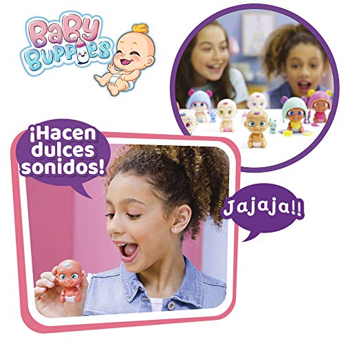 Baby Buppies Biberón Cuna mágico Sorpresa con complementos bebé muñeco, biberón, sonajero, chupete, babero, guía de cuidados y certificado de nacimiento juguetes niños 3 años