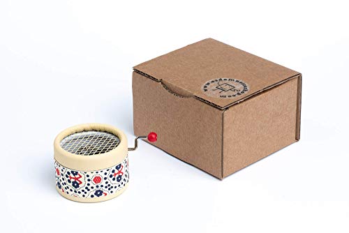 Caja de música manual artesanal roja con estampado de flores y la melodía principal de la película La bella y la bestia