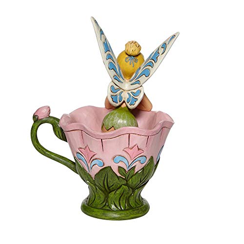 Enesco Las tradiciones de Disney Tinker Bell Sentado en una figurilla Flor