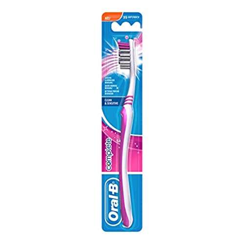 Oral-B Complete - Cepillo manual, color blanco y morado
