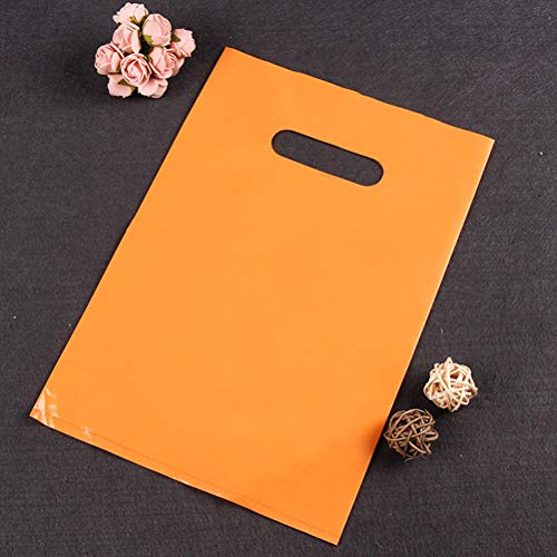 Bolsas de plástico de STOBOK 50 piezas de productos de venta al por menor con manijas troqueladas para comprar ropa de regalo (el color es aleatorio, 25x35cm)